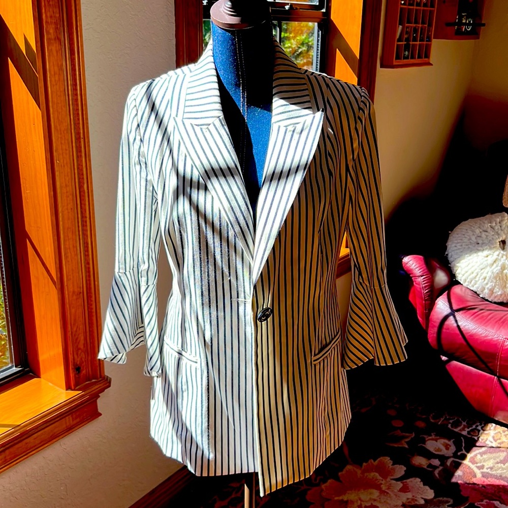 Adorable cabbie jacket with a bell sleeve, navy and white striped
